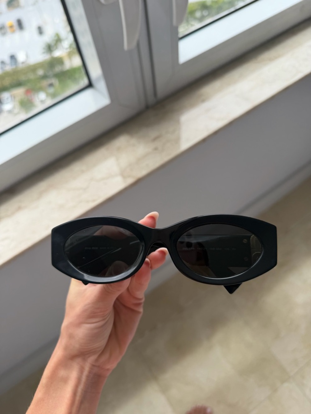 Miu Miu Black Cat-Eye Sunglasses for Women